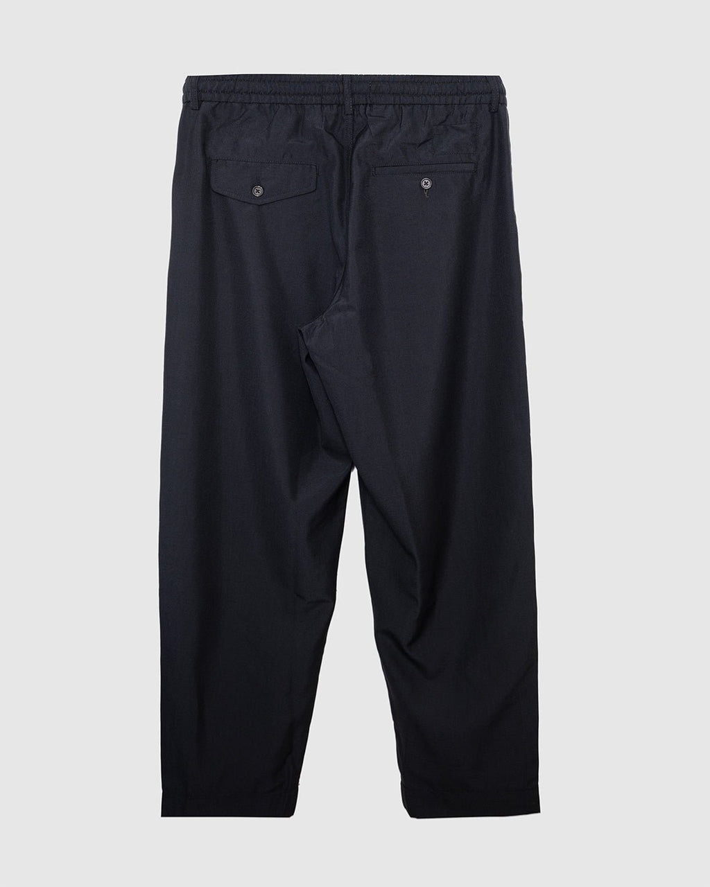 Pleated Track Pant Tropical Suiting Black - UNIVERSAL WORKS