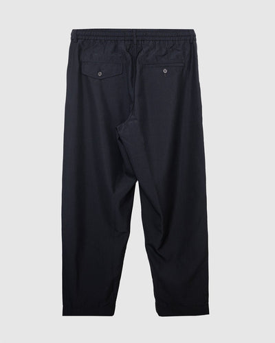 Pleated Track Pant Tropical Suiting Black - UNIVERSAL WORKS