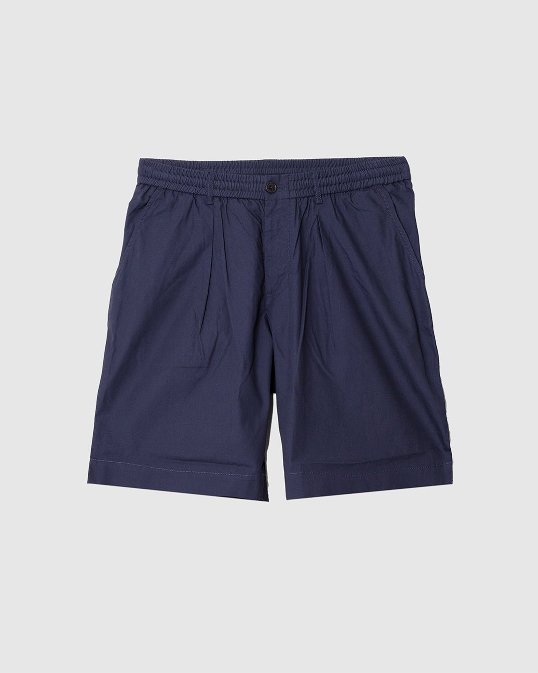 Pleated Track Short Peached Poplin Navy - UNIVERSAL WORKS
