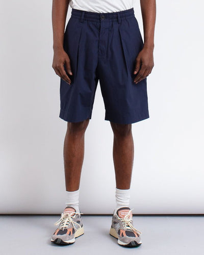 Pleated Track Short Peached Poplin Navy - UNIVERSAL WORKS